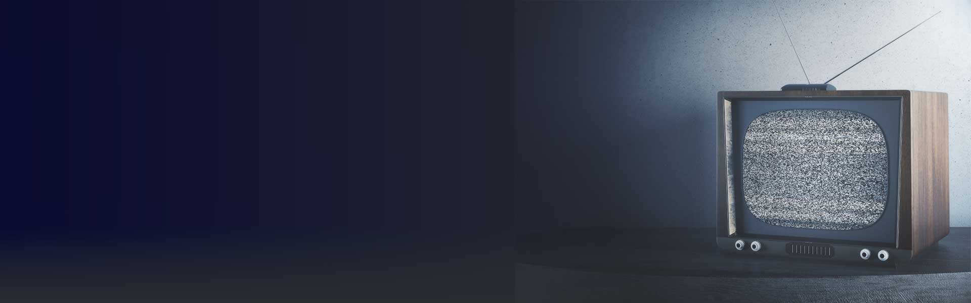 Retro television on gray background.