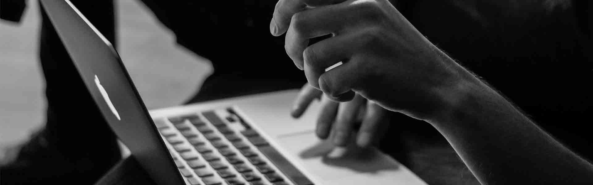 Photo of laptop with hands